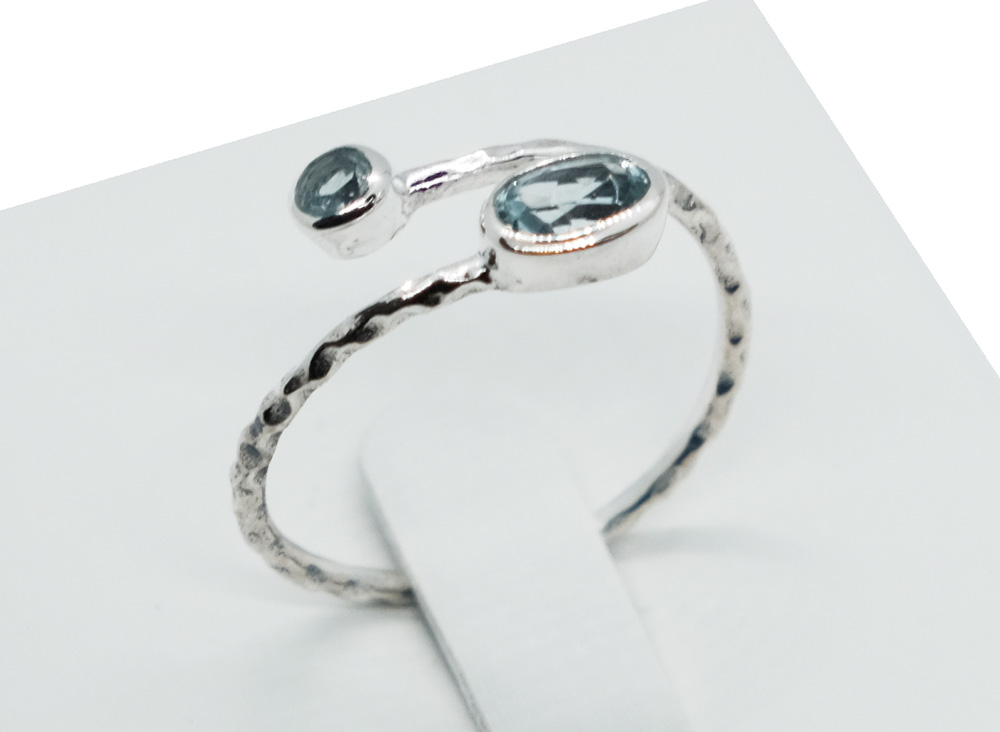 Silver Ring Twist Cut Topaz